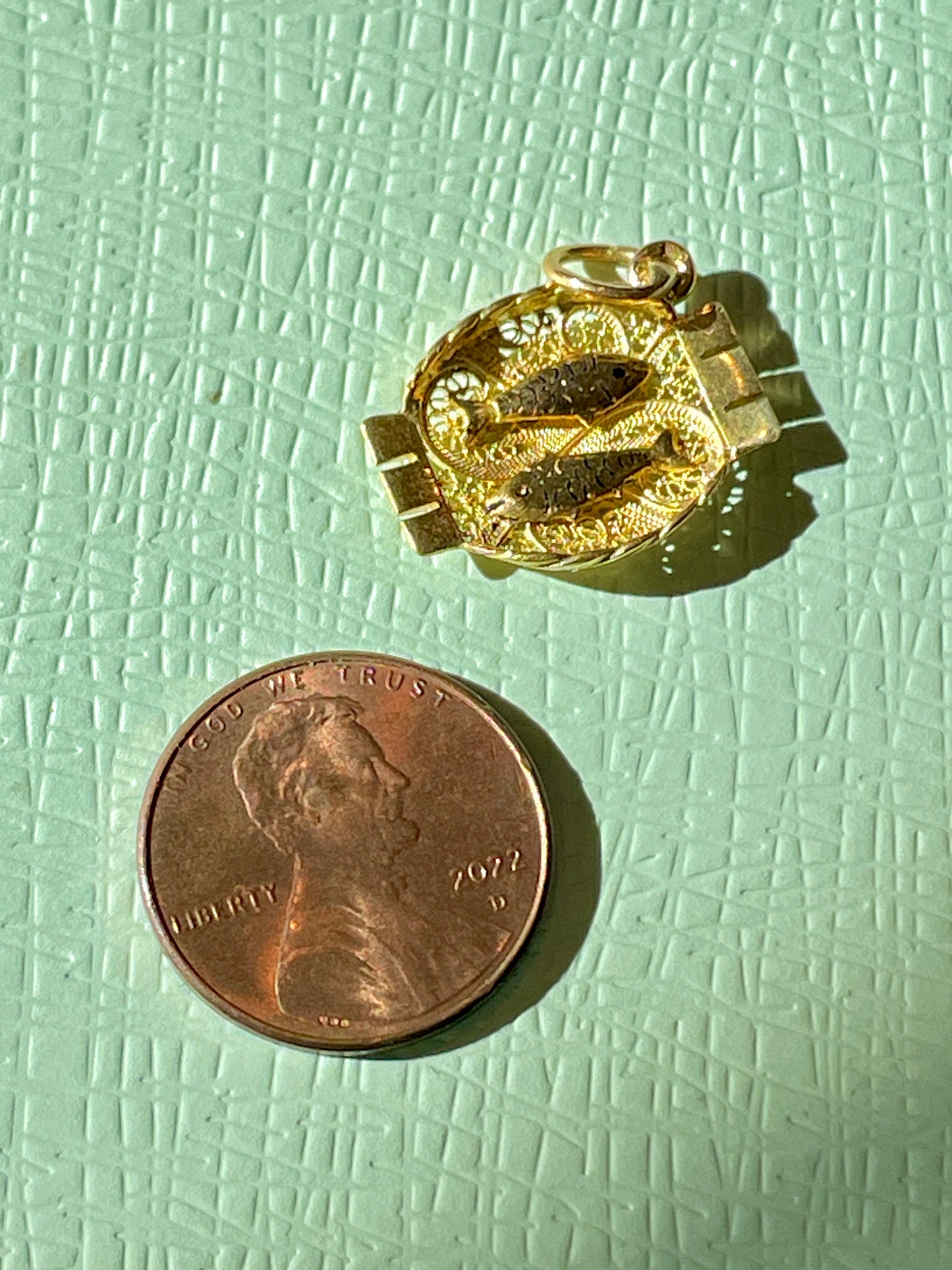Vintage yellow 19K gold fish filigree charm