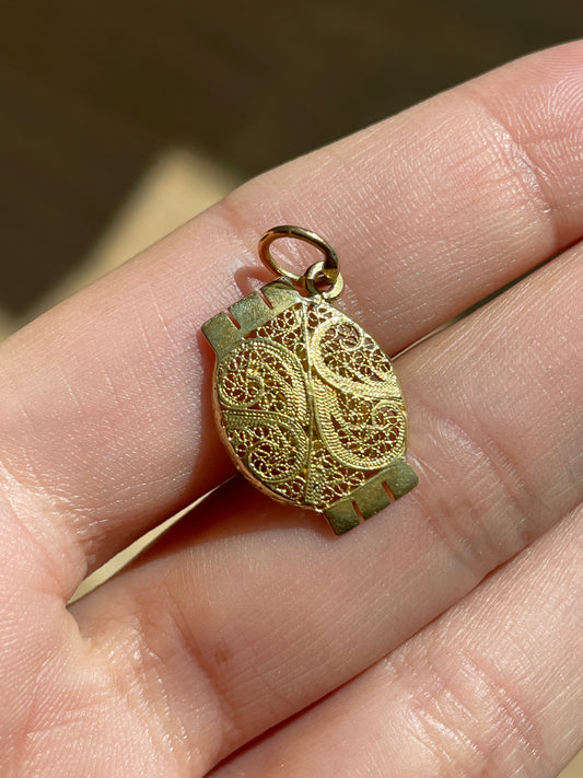 Vintage yellow 19K gold fish filigree charm