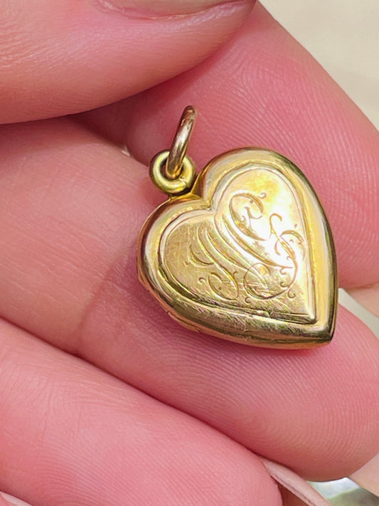 Antique yellow 14K heart locket with turquoise cabochon