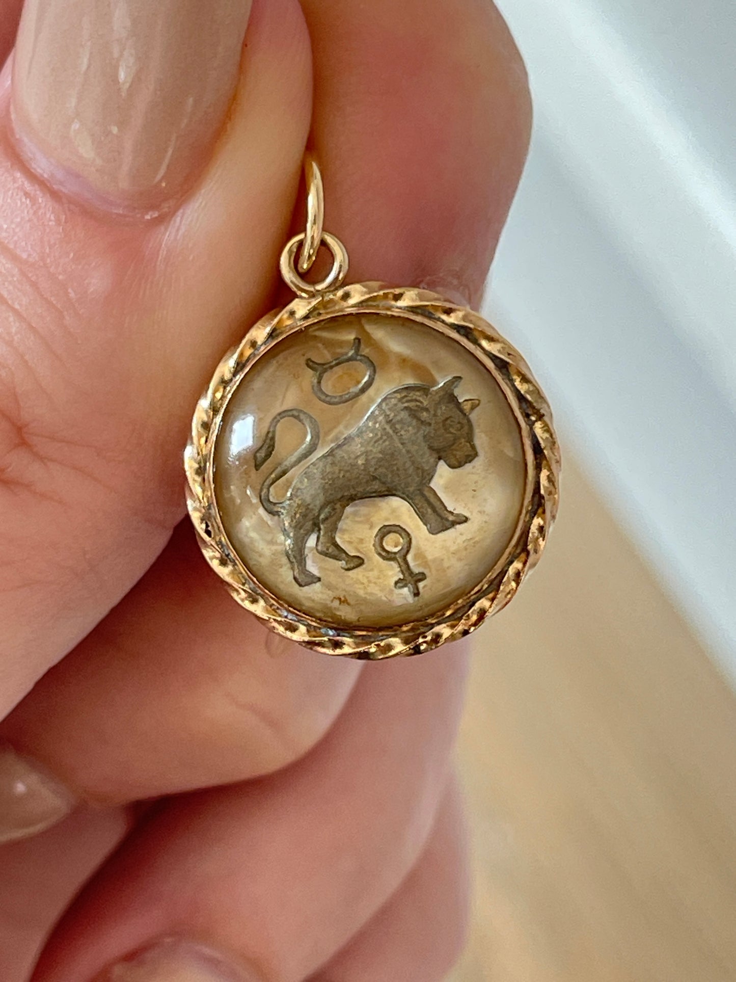 Vintage yellow 14K gold reverse crystal Taurus charm