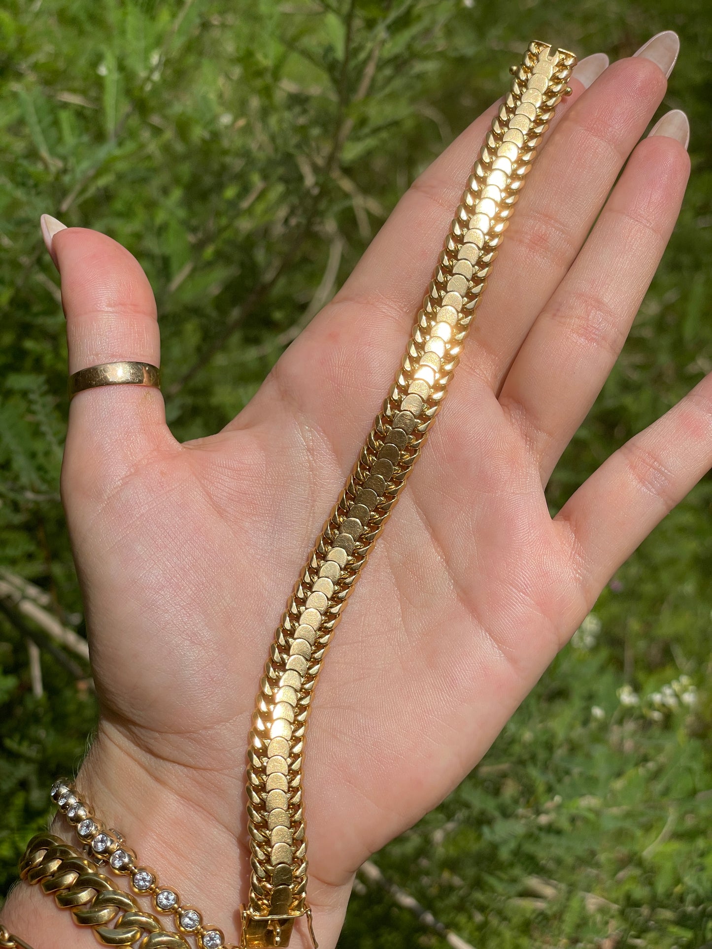Vintage yellow 18K Gübelin curb bracelet with crescent moon detail, 7.5 inch
