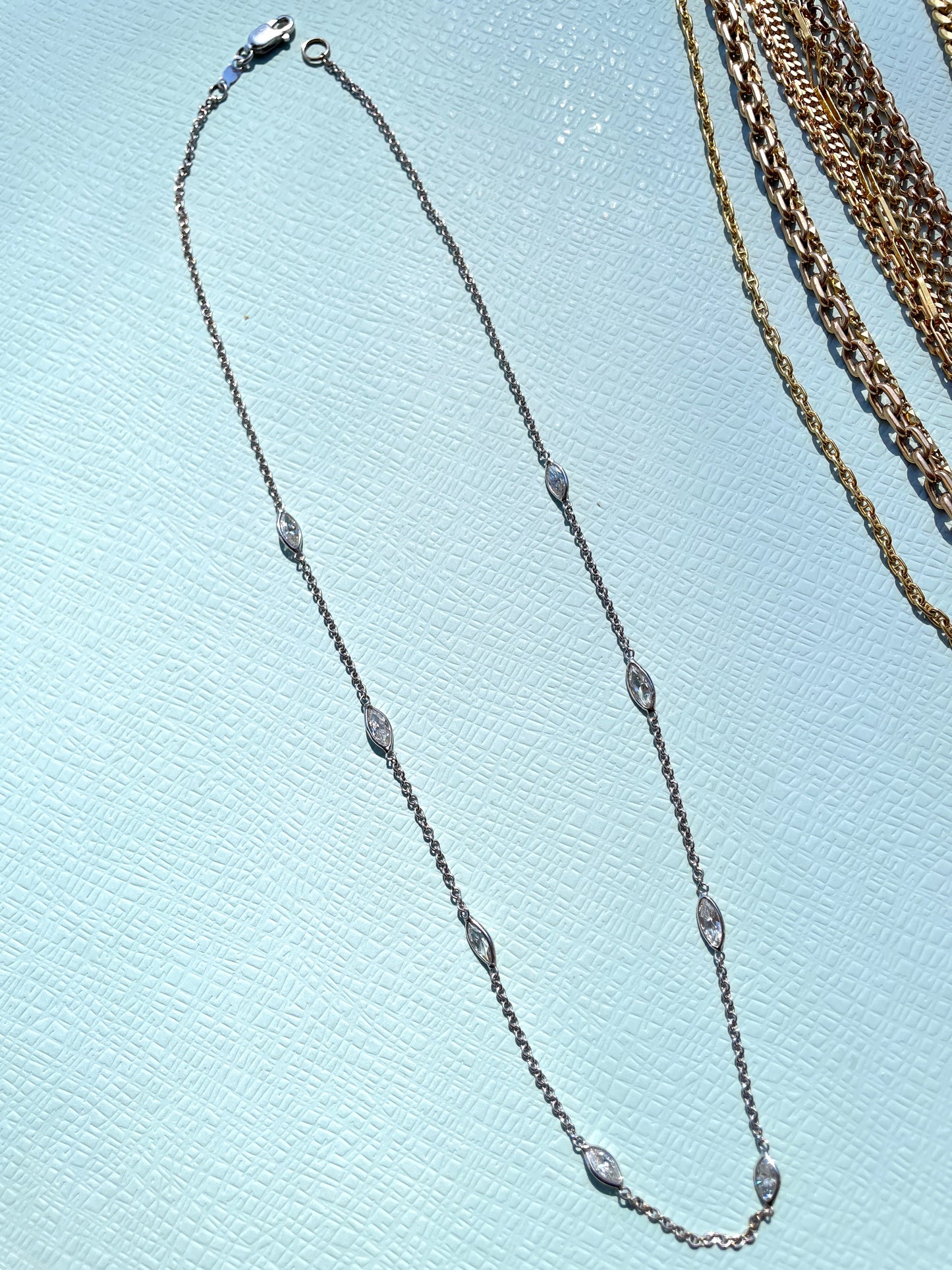 Estate white 18K gold marquise cut diamond approx 1.9 ctw station chain necklace, 17.5 inch