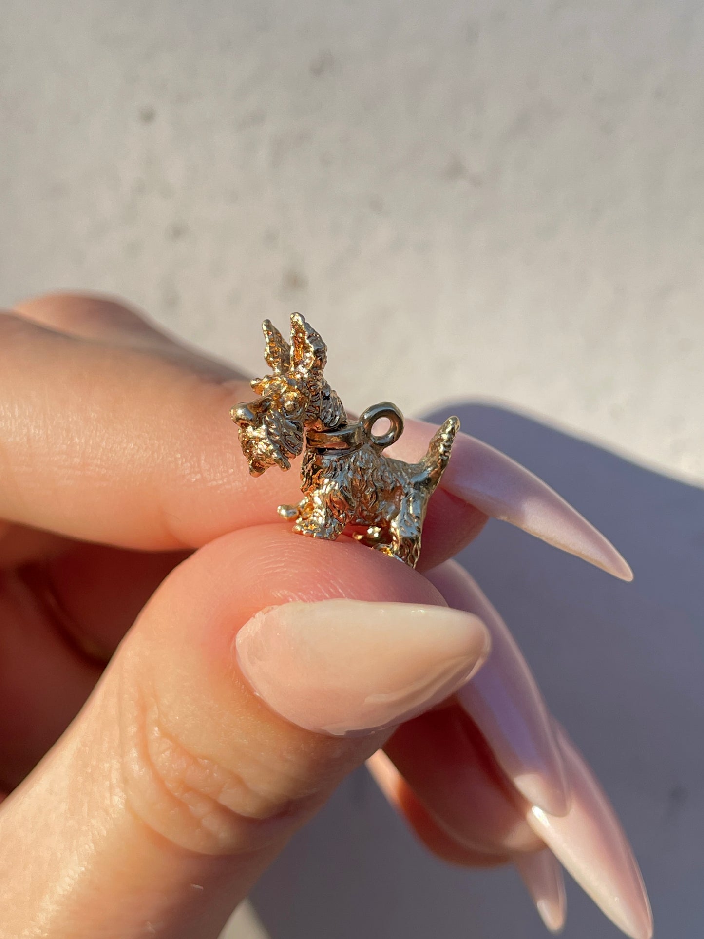 Vintage yellow 14K articulated Scottie dog charm