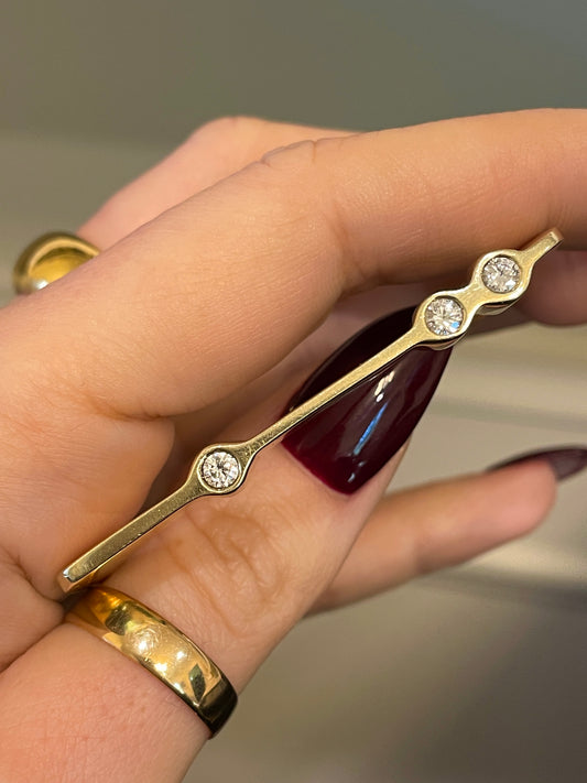 Vintage yellow 14K .42ctw diamond 3 stone hinge bangle