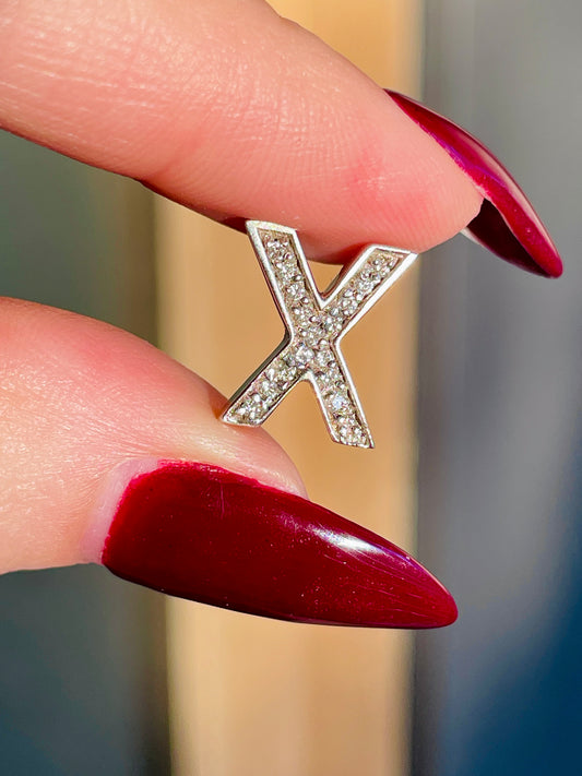 Vintage white 14K letter X charm with approx .13 ctw diamonds