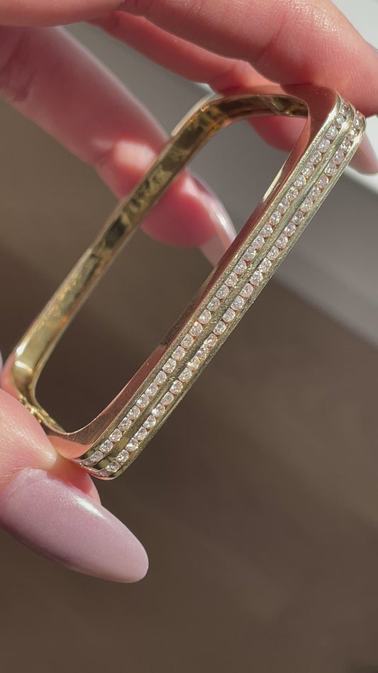 Vintage yellow 14K gold 1.2 ctw channel set diamond squared hinge bangle