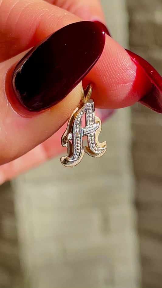 Vintage yellow and white 14K letter A charm