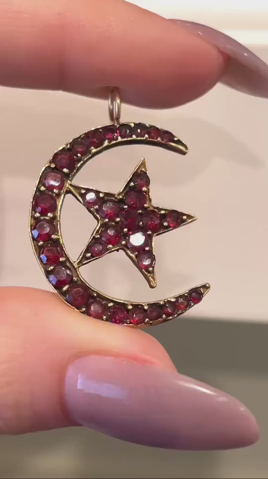 Antique yellow 14K garnet moon and star pendant