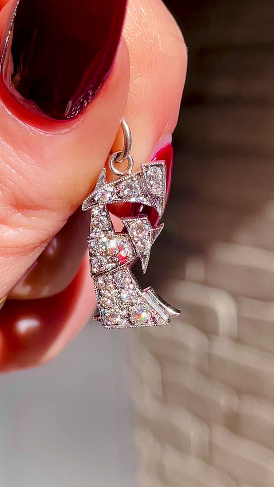 Vintage white 14K letter E charm with approx .6 ctw diamonds