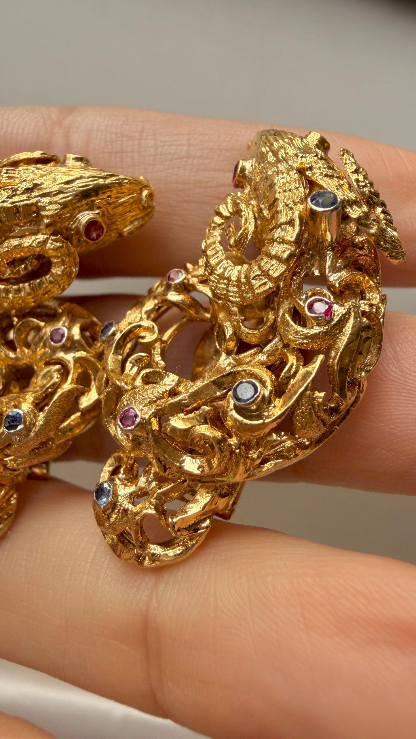 Vintage circa 1960s yellow 18K approx .6ctw sapphire and ruby ram clip statement earrings