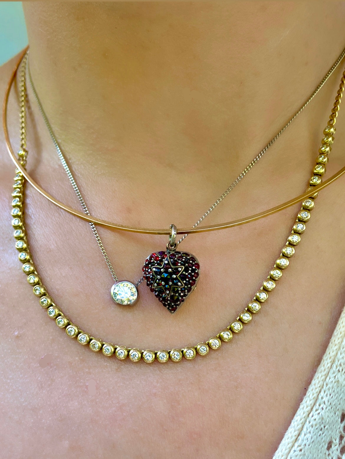 Antique sterling garnet heart celestial glass back locket charm