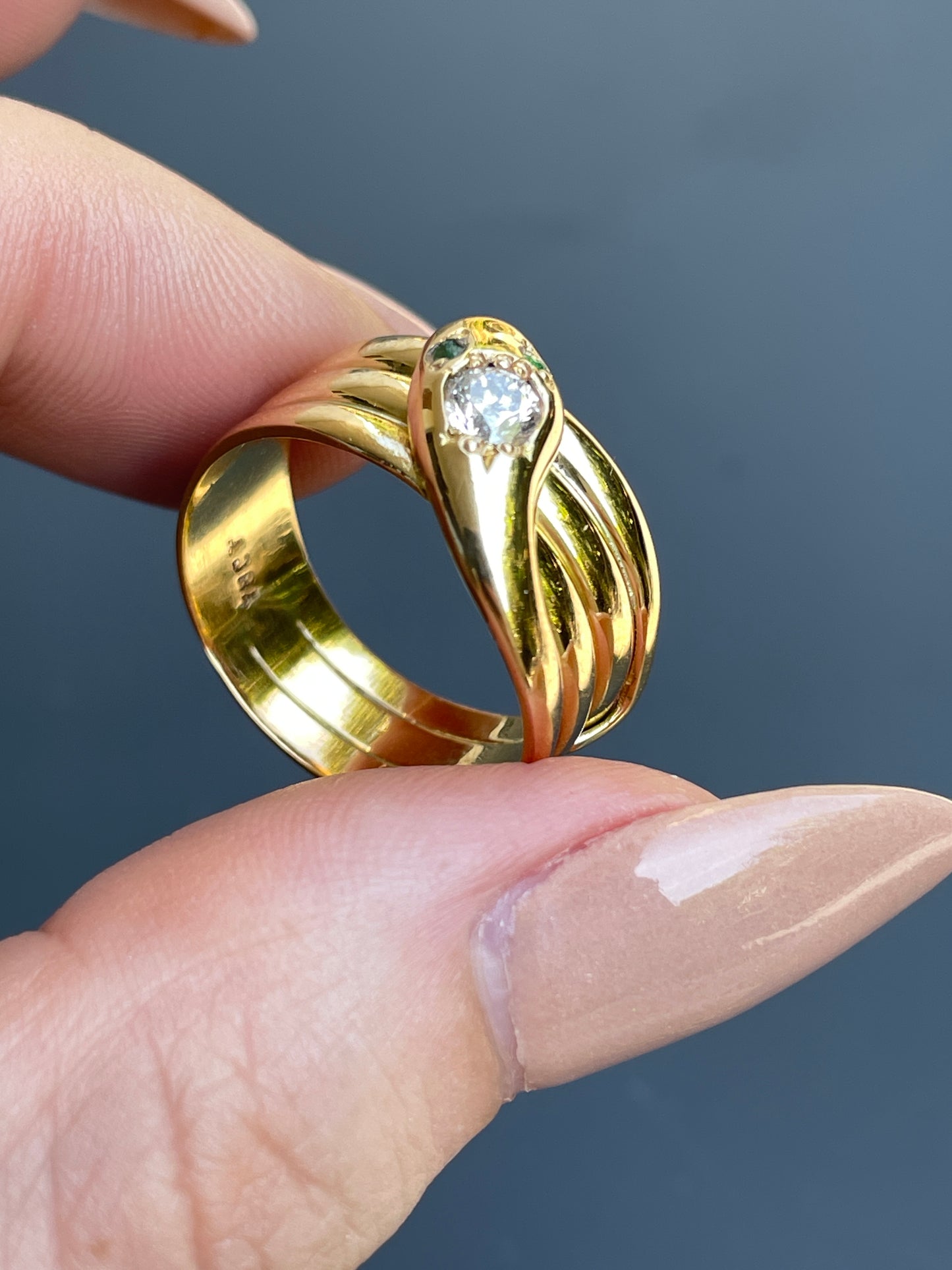 Vintage yellow 18K snake ring with approx .45 ctw diamond and emerald eyes, size 7.5