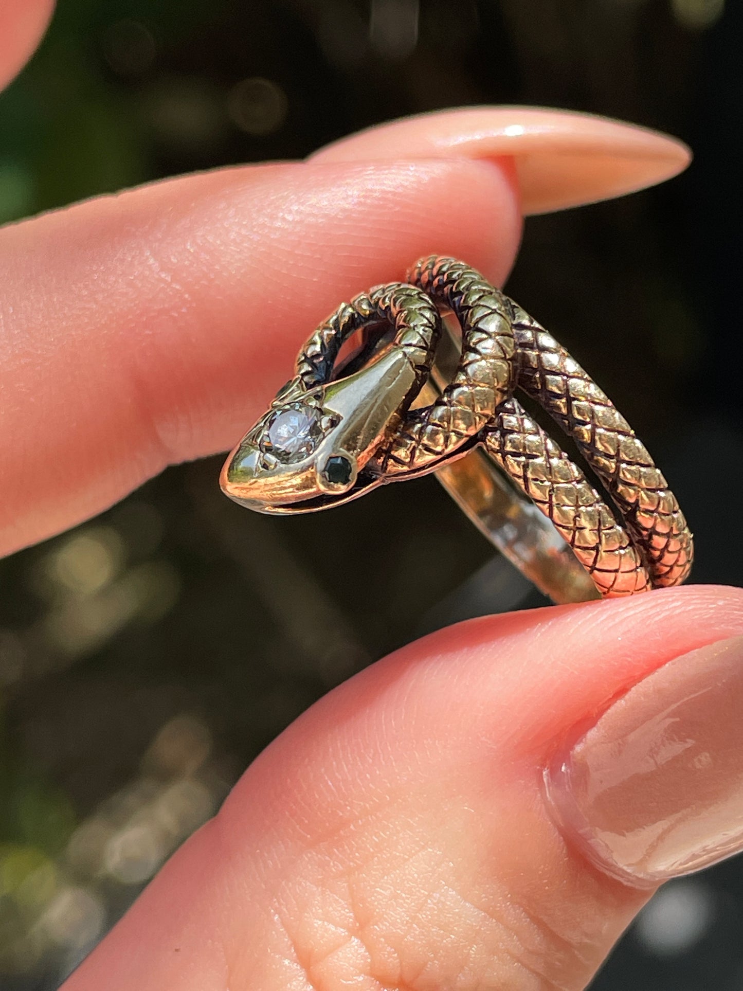Vintage yellow 14K textured snake ring with .1 ctw diamond and emerald eyes, size 6