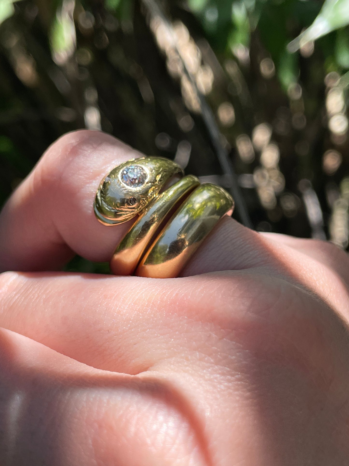 Antique yellow 18K happy face snake ring with approx .27 ctw old European cut diamond and rose cut diamond eyes, size 6.75-7