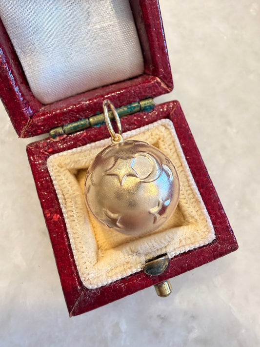 Vintage yellow 14K gold puffy ball with stars and moons charm