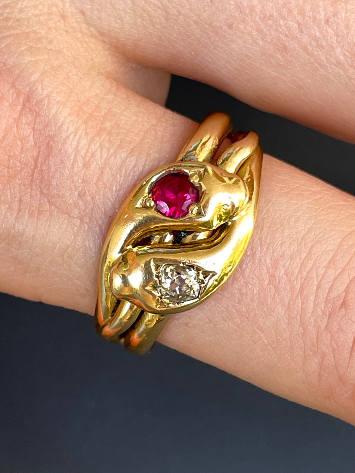 Antique Victorian yellow 18K pair of snakes ring with .25 ctw old mine cut diamond and .35 ctw ruby, size 11