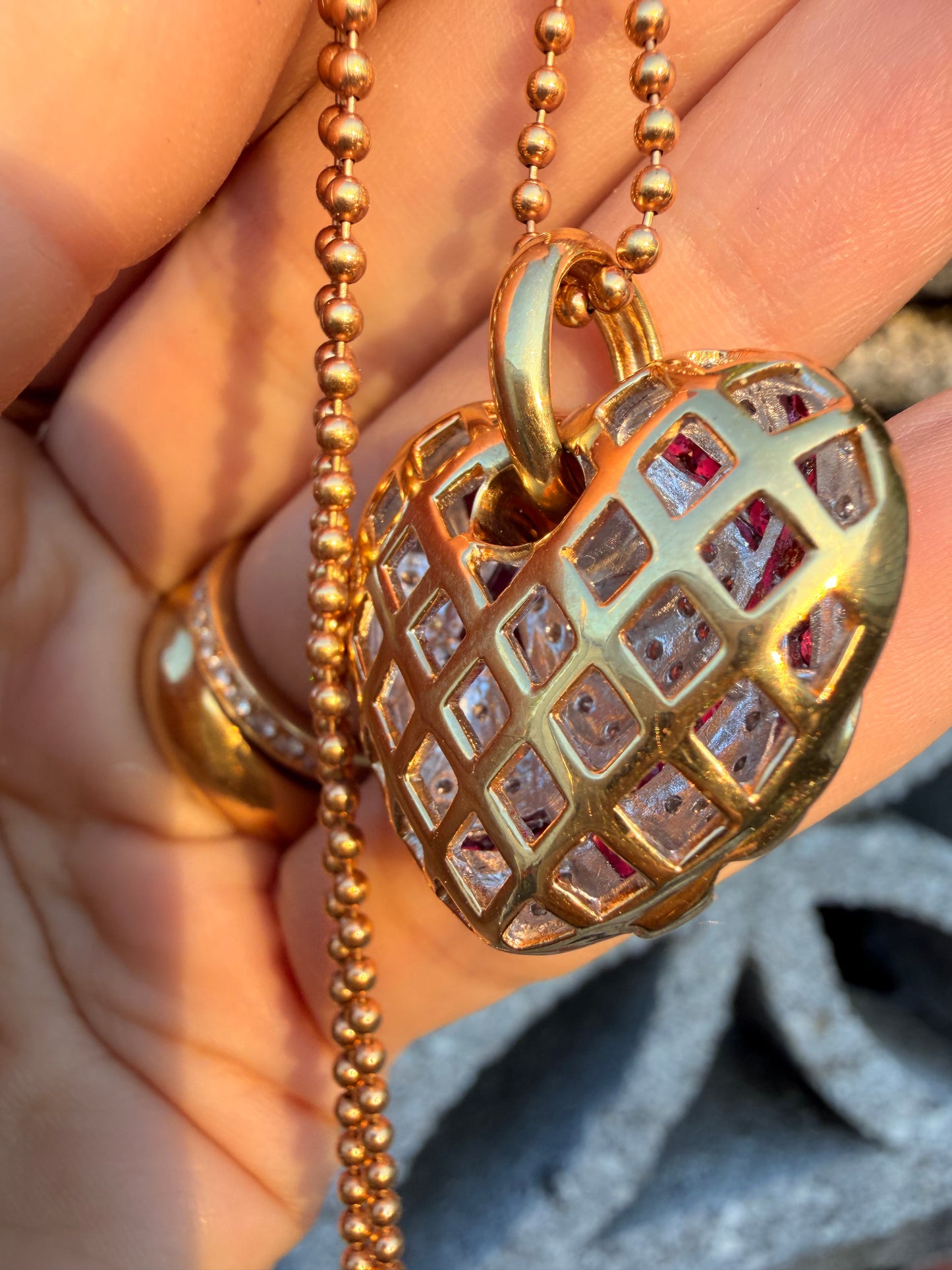 Vintage 18K approx 1.75ctw natural ruby and .55ctw diamond wrapped heart pendant