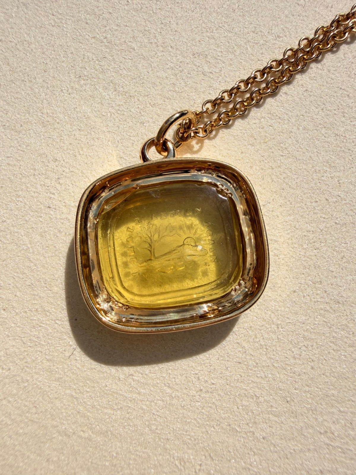 Antique 18K intaglio set in custom yellow 18K tourmaline border pendant by Bauble Magpie