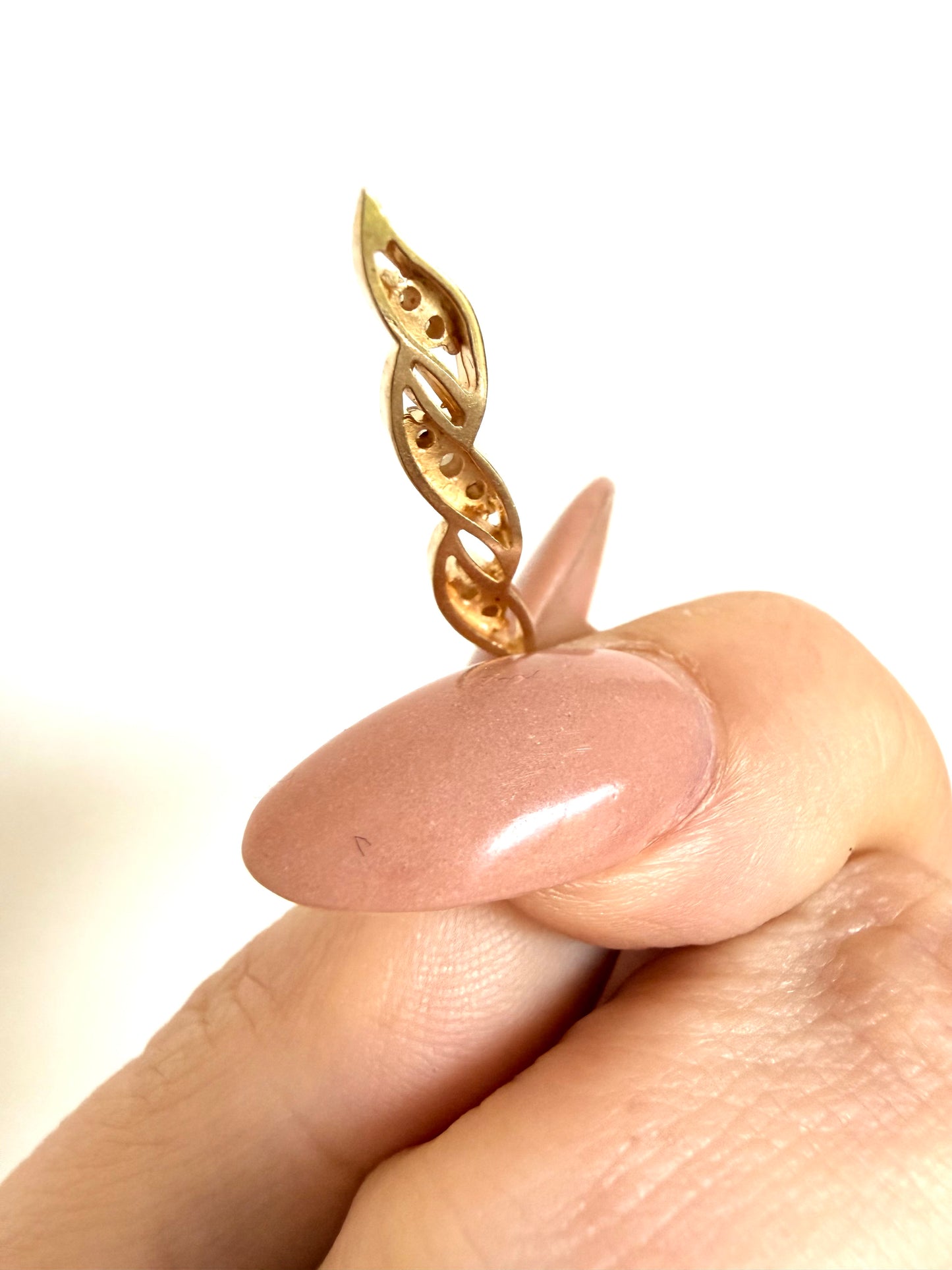 Vintage Yellow 14k approx .17ctw diamond swirl charm