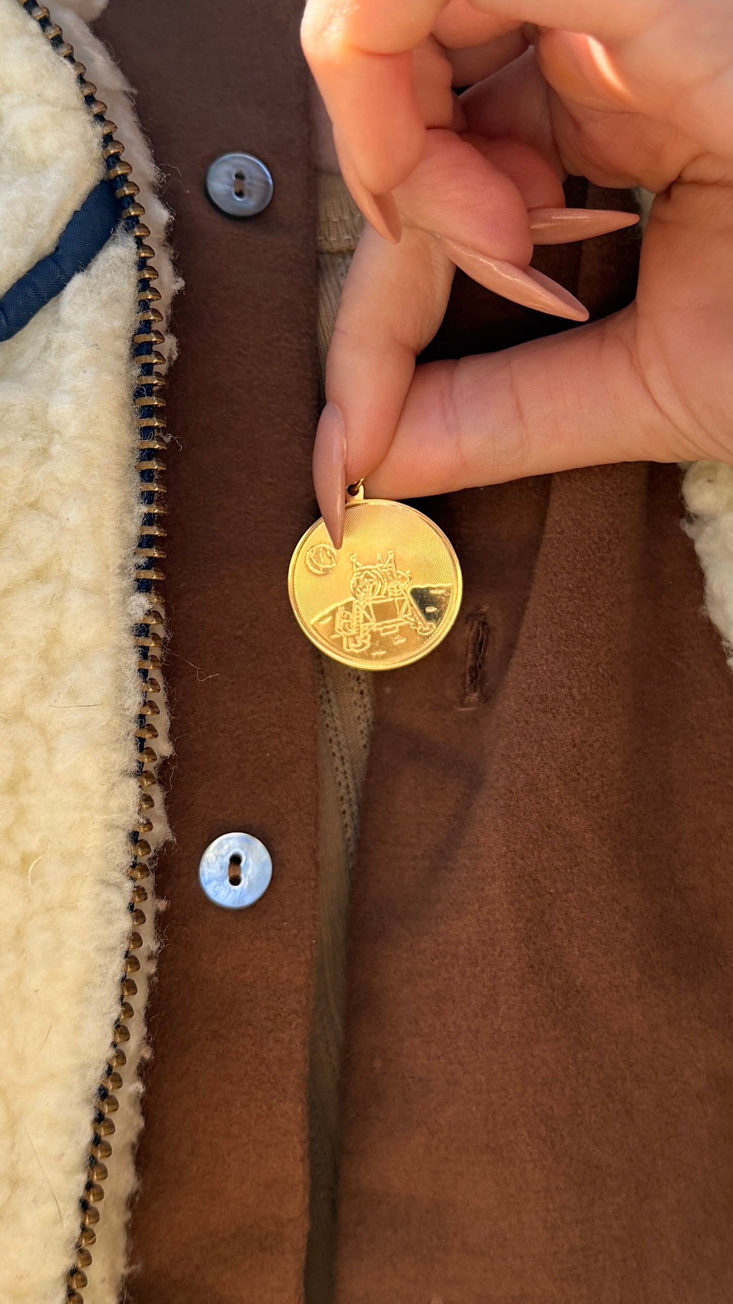 Vintage yellow 14K commemorative Moon Landing pendants with box from 1969