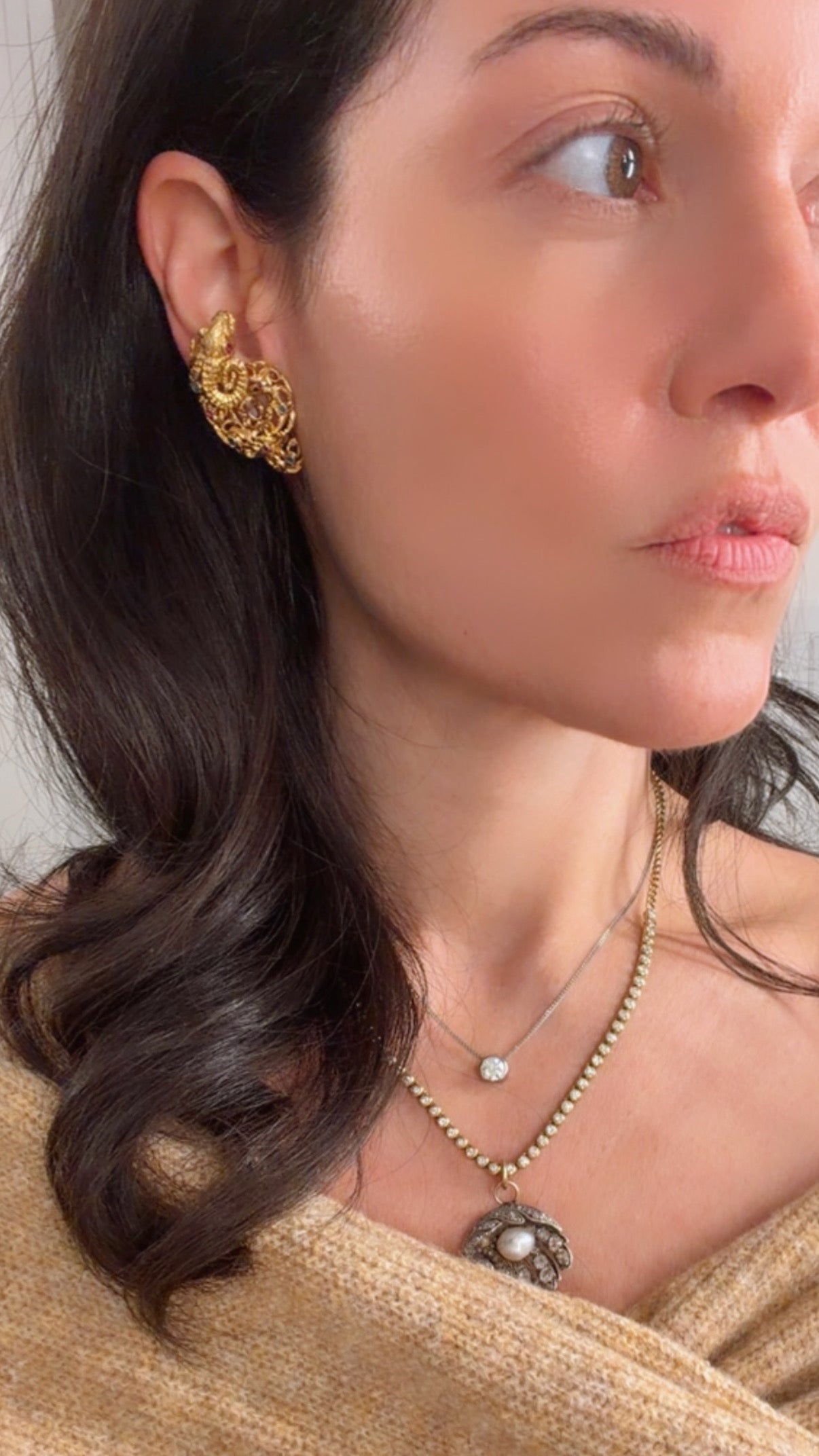 Vintage circa 1960s yellow 18K approx .6ctw sapphire and ruby ram clip statement earrings