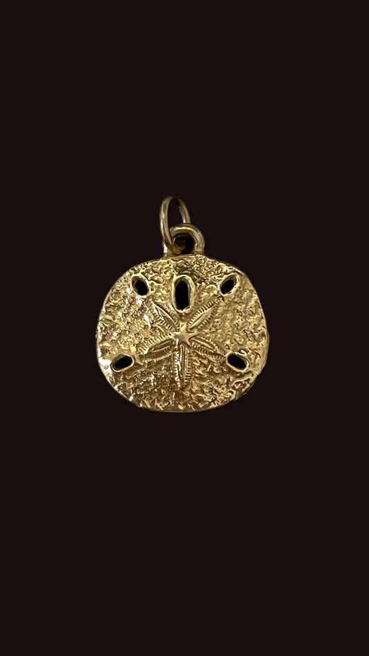 Vintage yellow 14K sanddollar charm