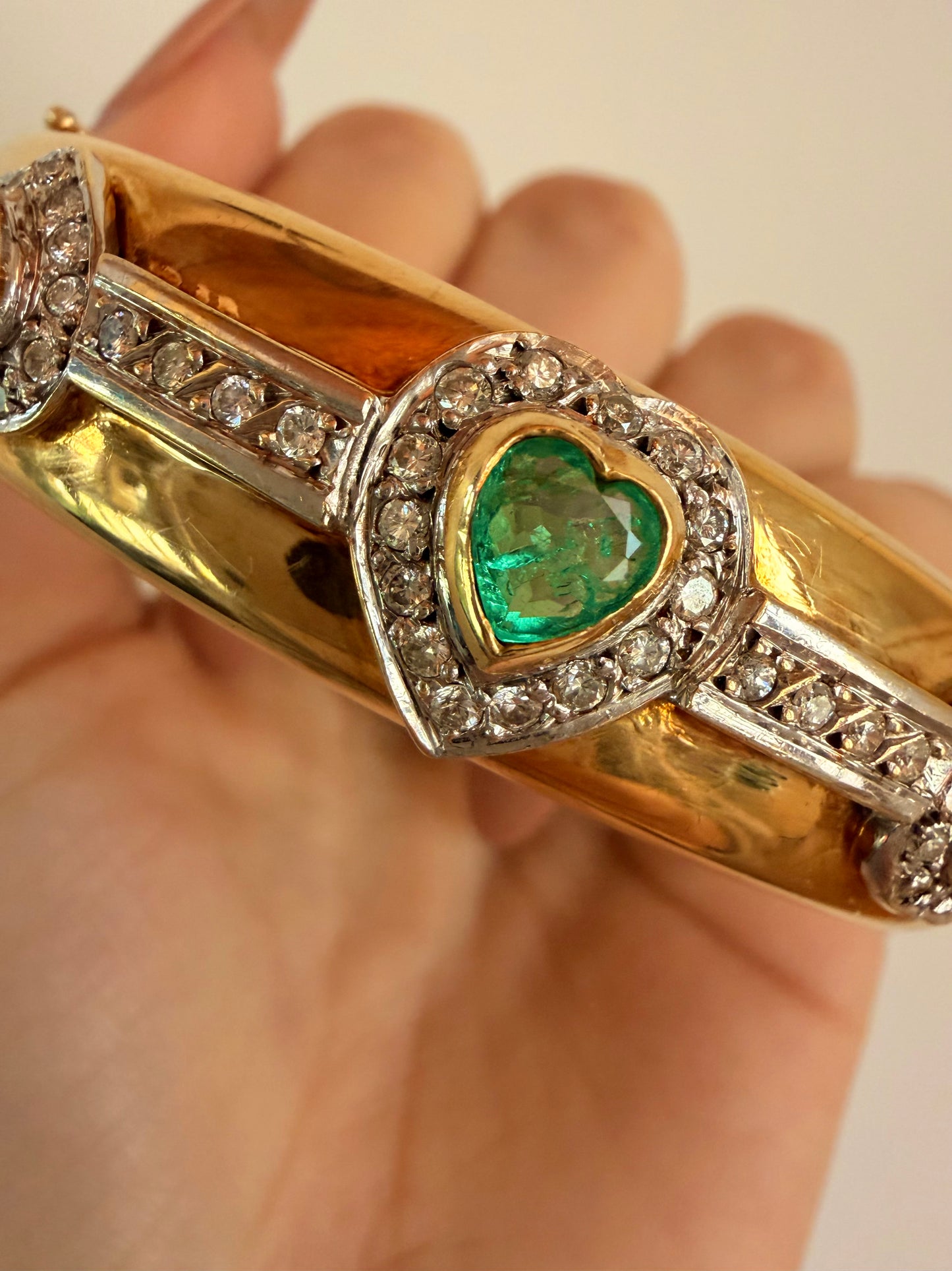 Vintage yellow 18K triple 1.73 ctw emerald and 1.14 ctw diamond heart bangle