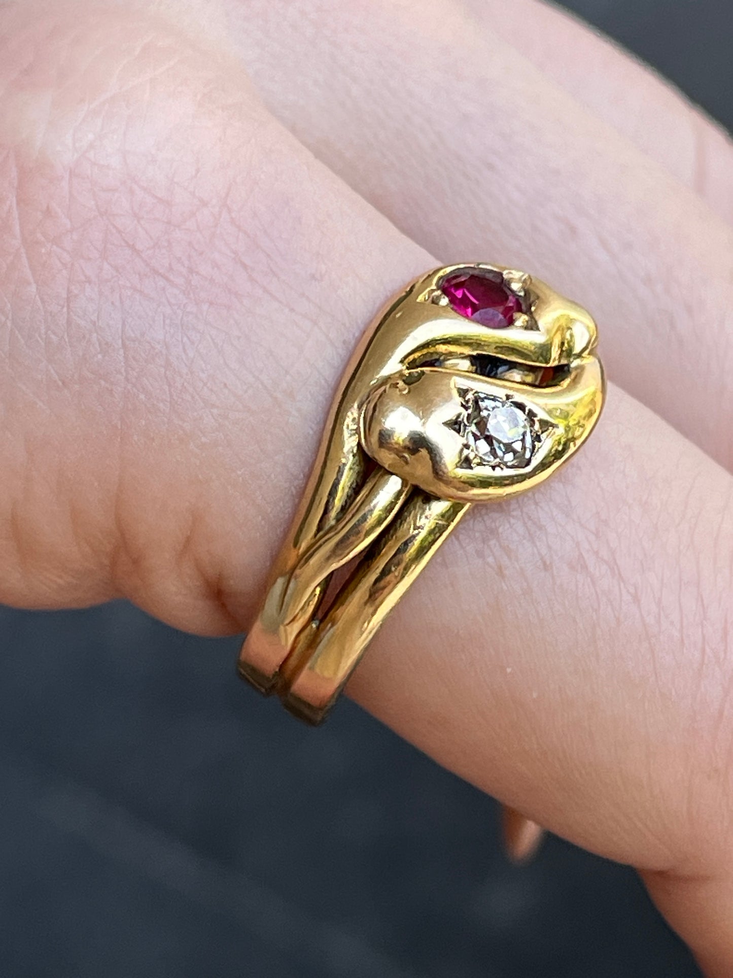 Antique Victorian yellow 18K pair of snakes ring with .25 ctw old mine cut diamond and .35 ctw ruby, size 11