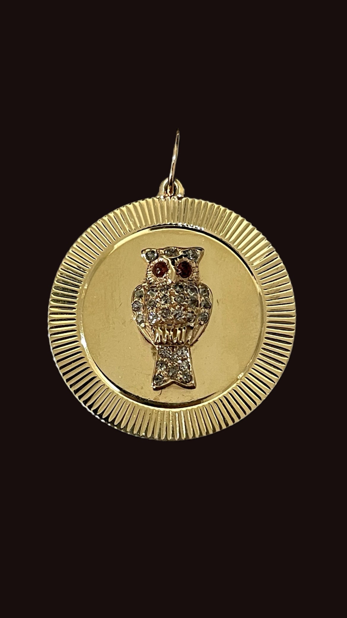 Vintage yellow 14K gold .3ctw old mine, old cut and rose cut diamond owl with garnet eyes engine turned pendant