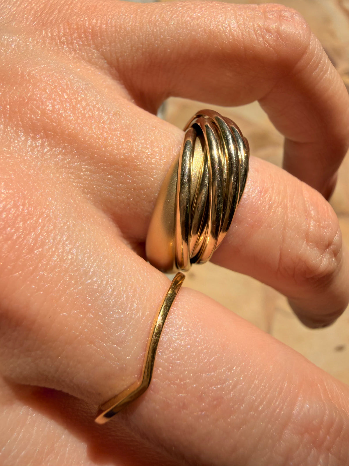 Vintage yellow 18K Pomellato designer eleven band rolling ring, size 6.25-6.5