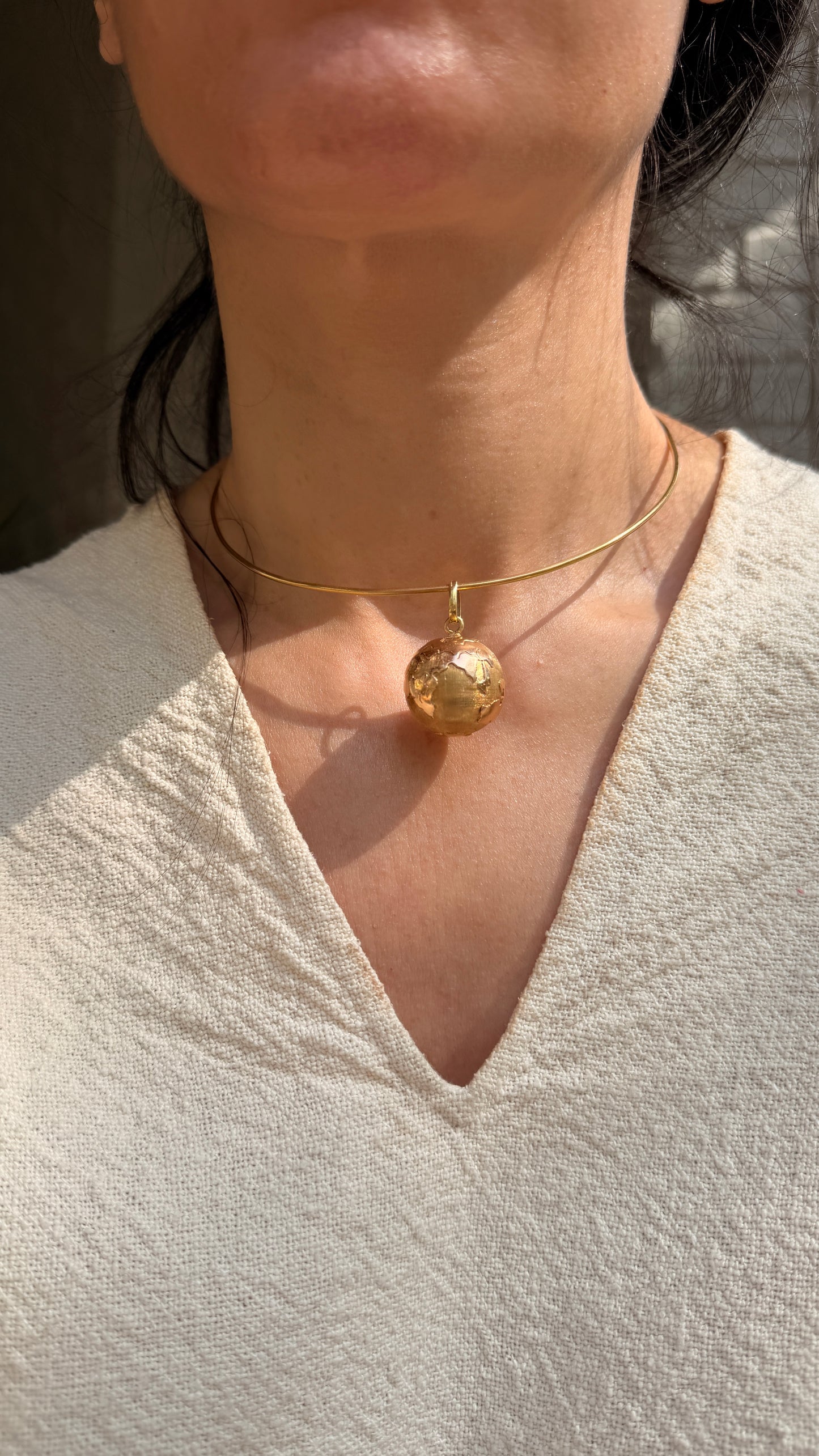 Vintage yellow 14K gold 3D globe pendant
