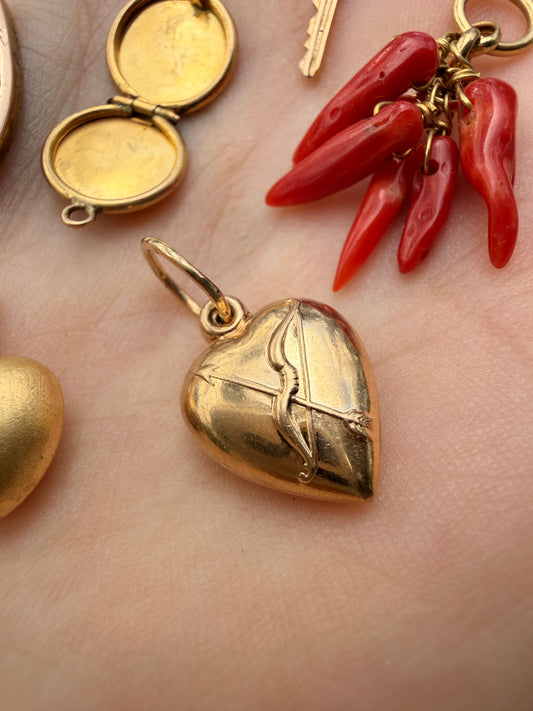 Vintage yellow 14K gold bow and arrow puffy heart charm