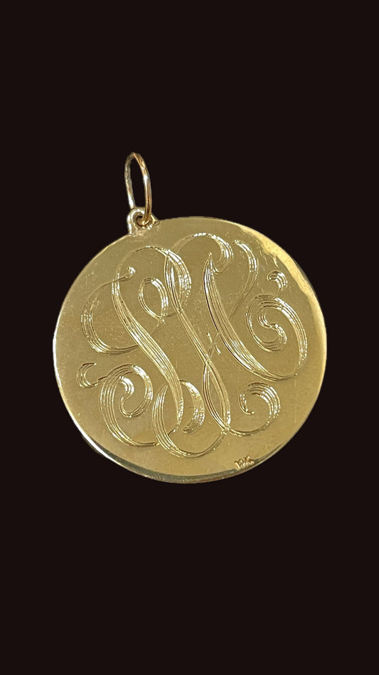 Vintage yellow 14K gold .3ctw old mine, old cut and rose cut diamond owl with garnet eyes engine turned pendant
