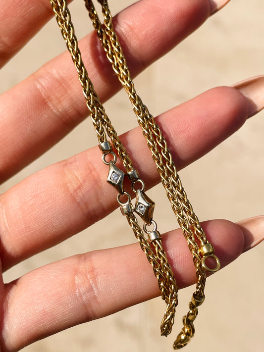 Vintage yellow 18K double sided .16 ctw diamond station wheat chain necklace, 17.75 inch