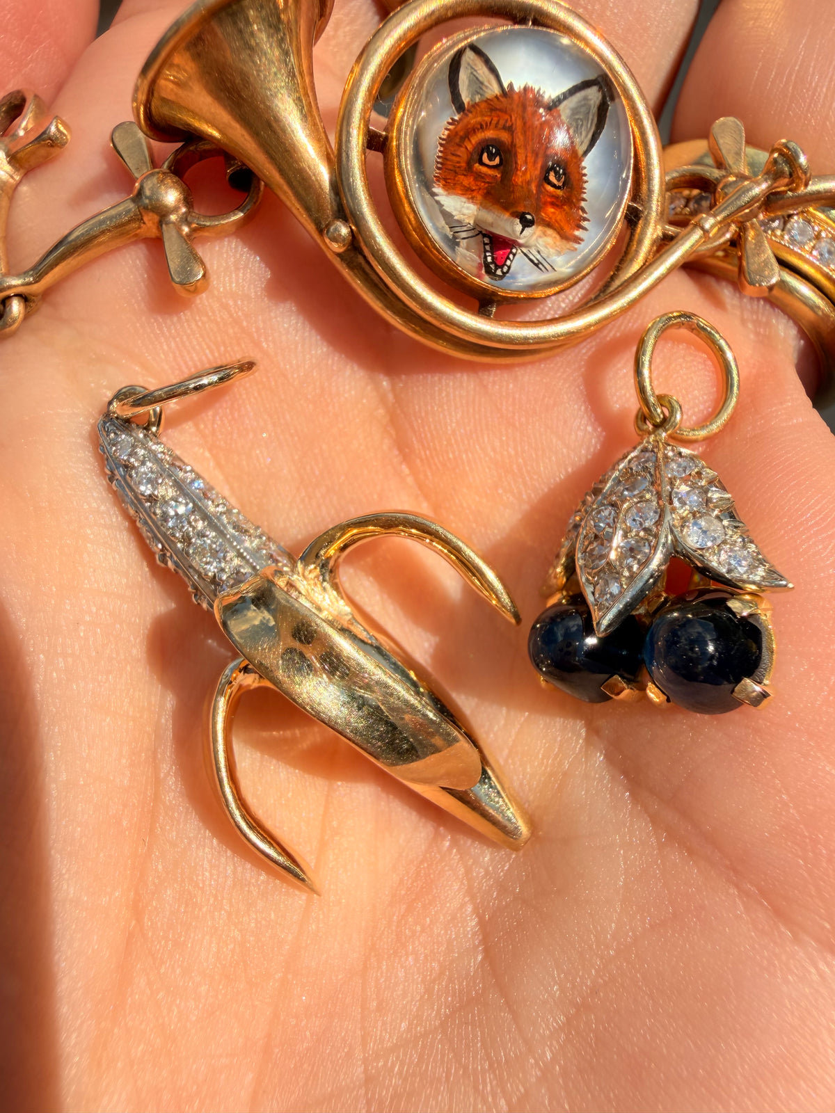 Vintage 14K diamond banana pendant