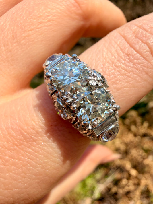 Vintage 1930/40s platinum domed ring with 3.7ctw old euro cut and old cut diamonds, size 7