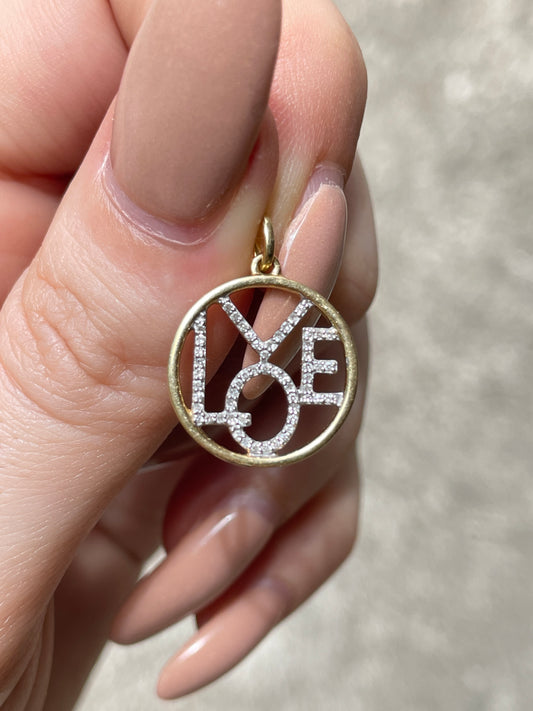 Vintage yellow 14K approx .14ctw diamond LOVE charm