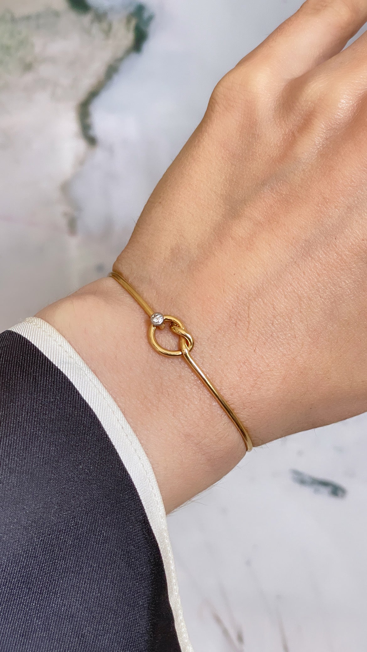Vintage yellow 14K gold approx .03ctw diamond love knot bangle
