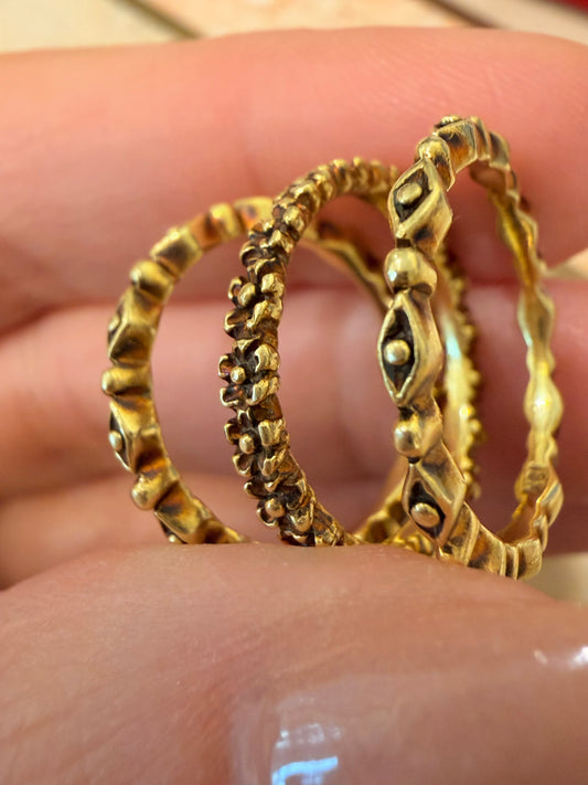 Vintage yellow 18K patterned eternity bands