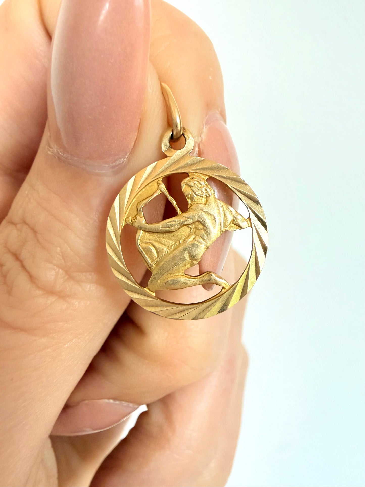 Vintage yellow 14K engine turned Sagittarius open work charm