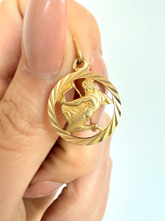 Vintage yellow 14K engine turned Sagittarius open work charm