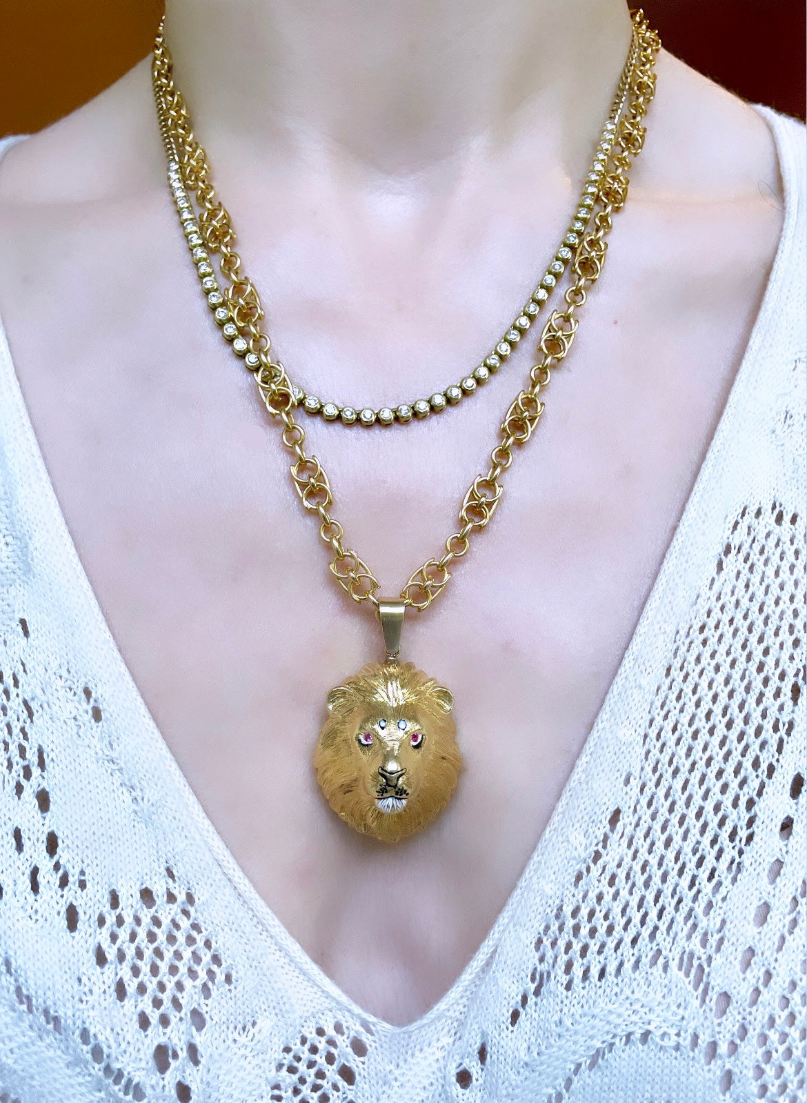 Vintage yellow 18K Lion statement pendant with enamel and ruby eyes