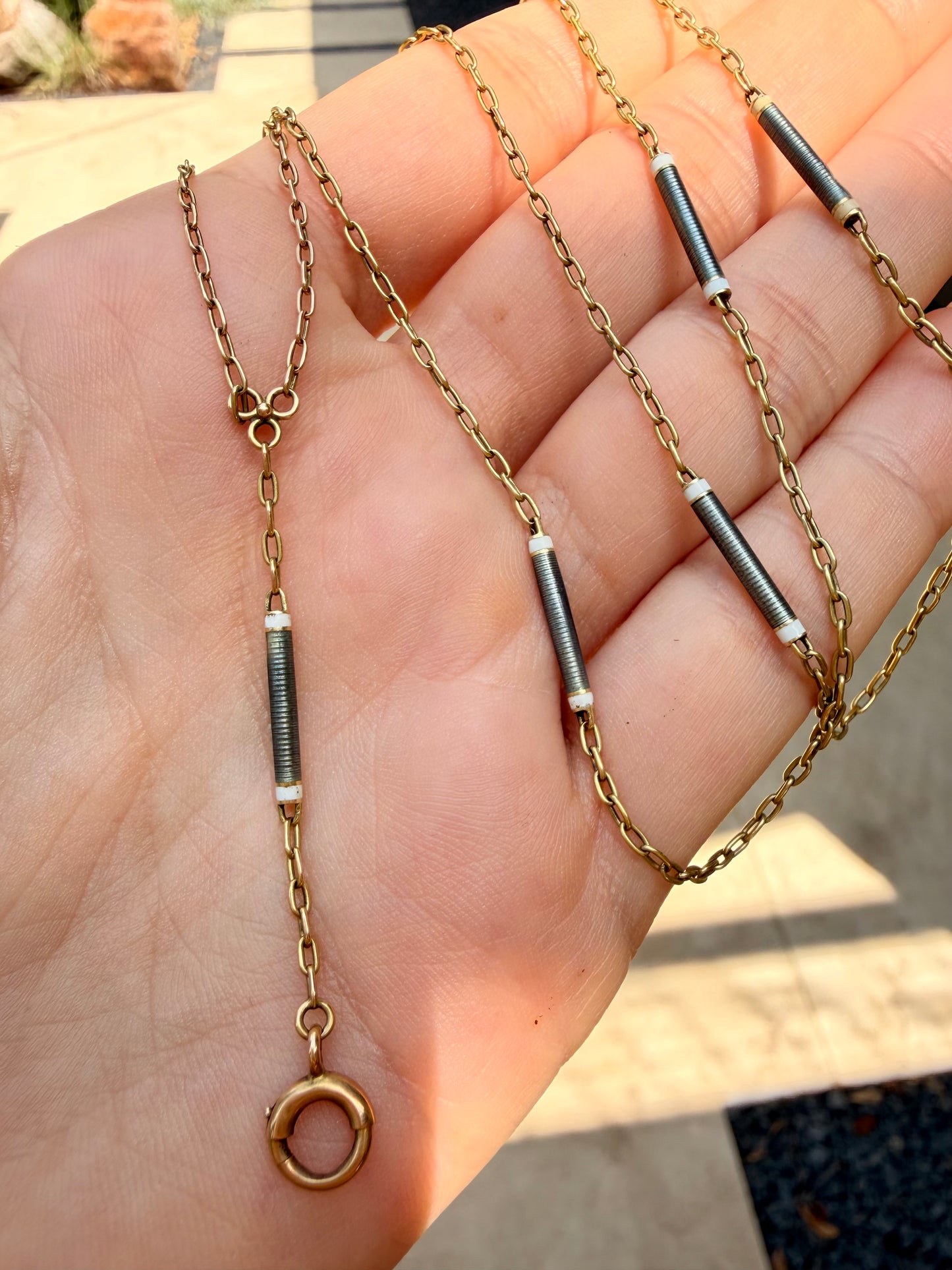 Antique yellow 14K gold grey and white enamel bar link chain with bolt drop, 21.5 inch