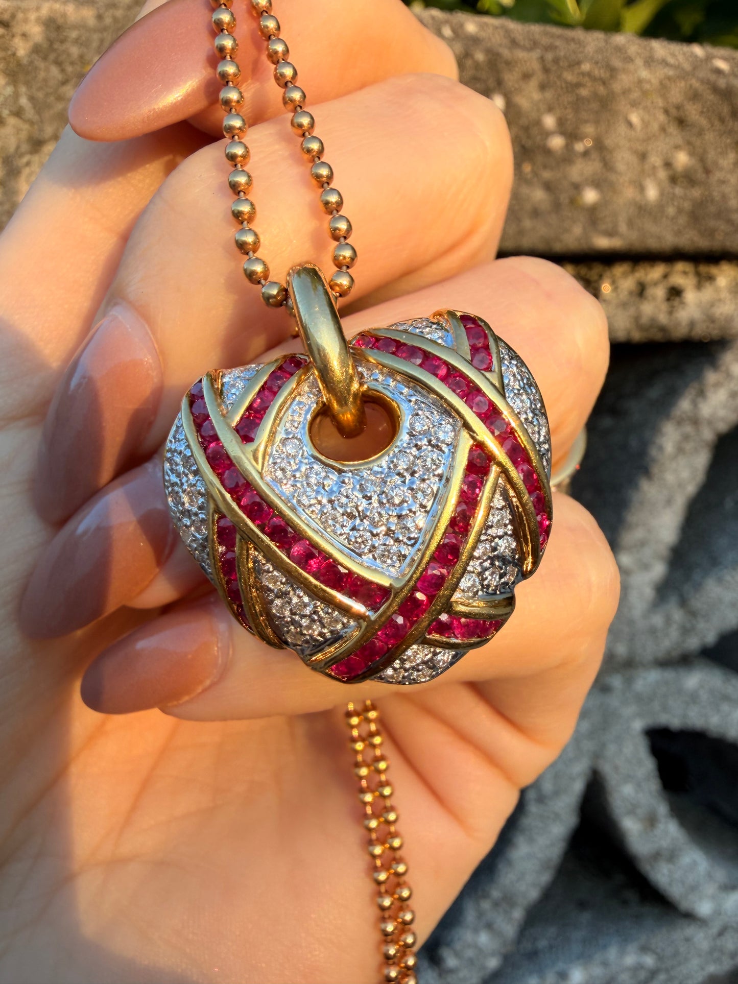Vintage 18K approx 1.75ctw natural ruby and .55ctw diamond wrapped heart pendant