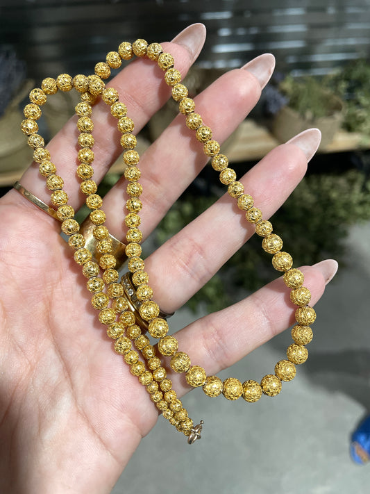 Antique yellow 14K textured graduated bead chain