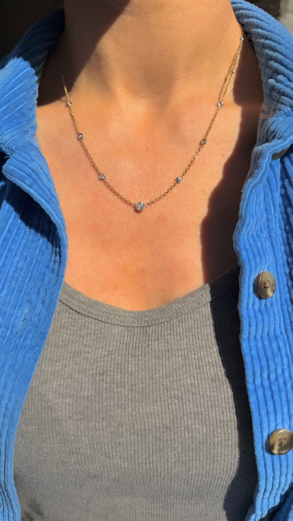 Vintage 18K approx 1.2ctw Old European Cut diamond and round diamond station chain, 18 3/8 inch