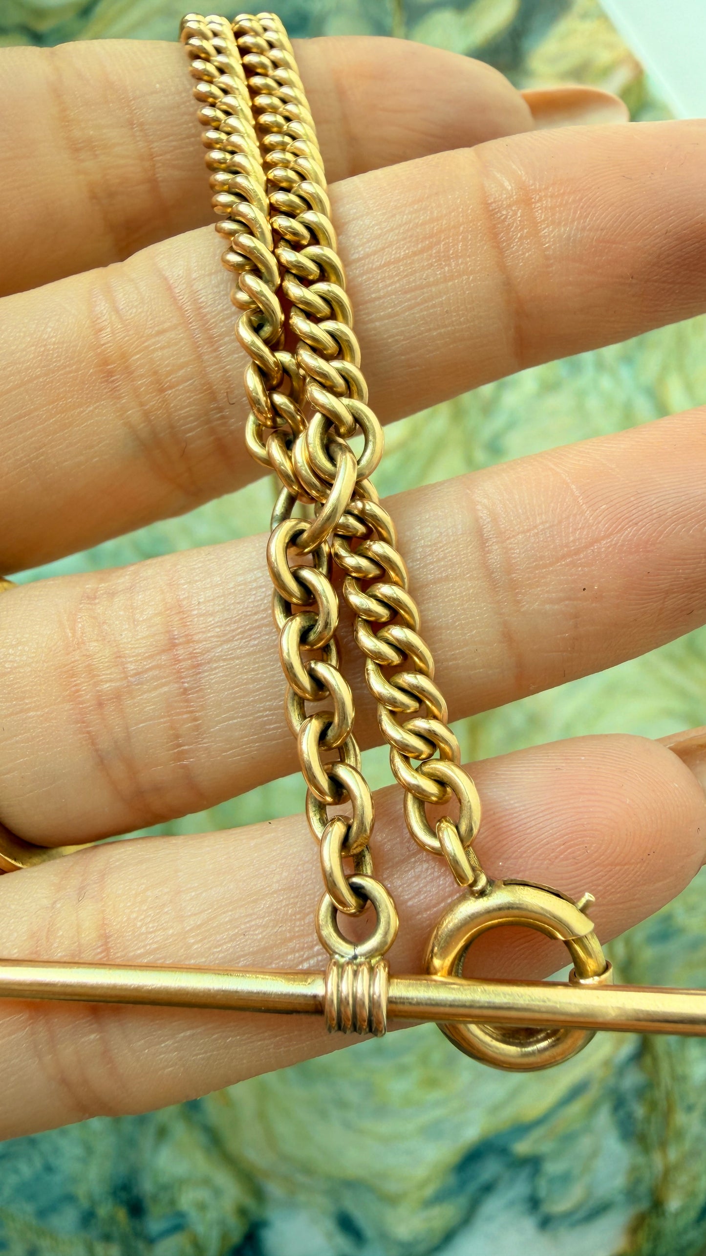 Antique yellow 14K round curb watch chain, 19 and 5/8 inch with 1.5 inch bolt dangle