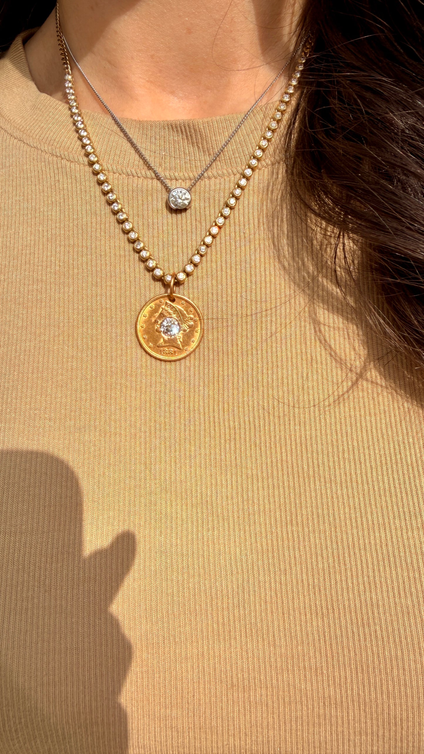 Antique yellow 21K gold 1881 $5 US Liberty coin with approx 1.1 ctw old mine cut diamond pendant