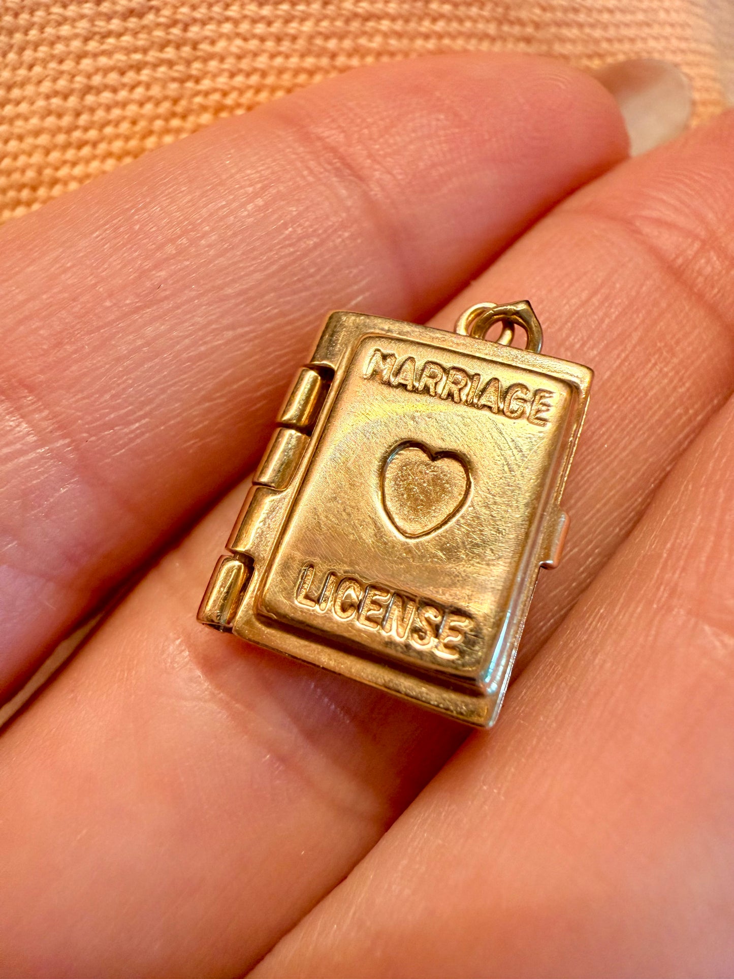Vintage yellow 14K gold articulated marriage license book charm