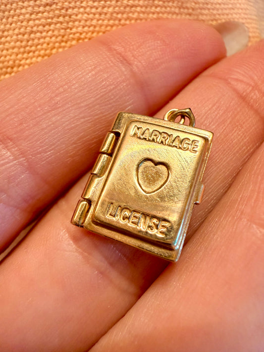Vintage yellow 14K gold articulated marriage license book charm